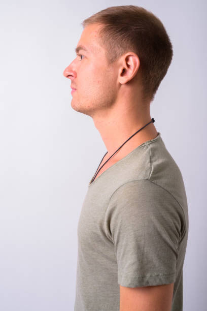 istock Portrait Of Young Man Against White Background 910062812
