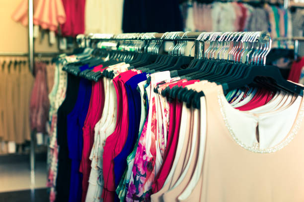istock Looking for new dress in showroom 910065812