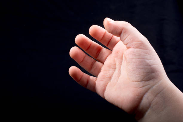 istock Five  fingers of a human hand partly seen in view 910066986
