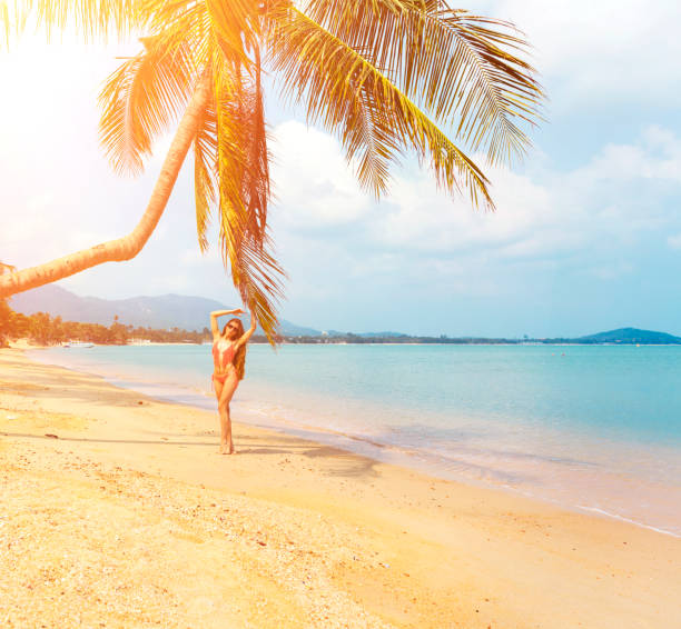 istock Woman on the beach 910069690