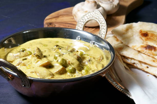 istock Creamy Fenugreek Mushroom peas curry 910073990