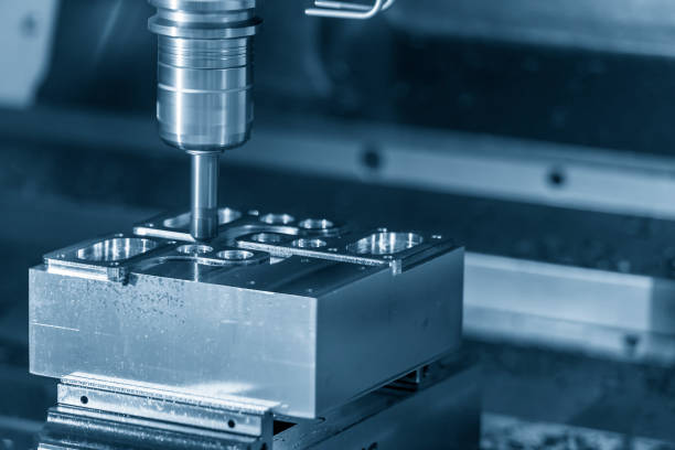 istock The CNC milling machine cutting the sample part. 910074288