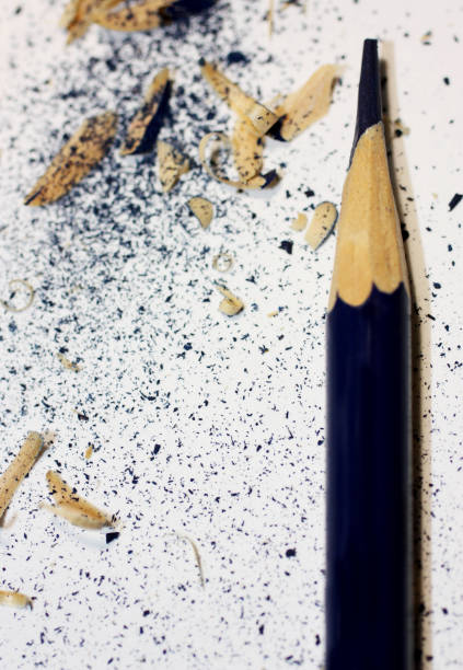 istock Blue pencil and crayon shavings with place for your text or other design elements. 910074496
