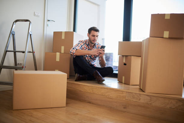 Man in new apartment stock photo