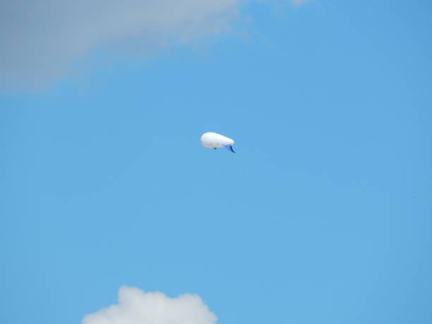 istock The airship is high in the blue sky 910088250