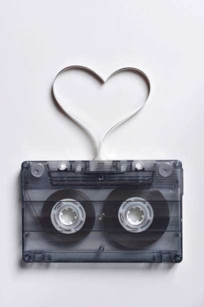 istock Close-Up Of Heart Shape Audio Cassette Against White Background 910089096