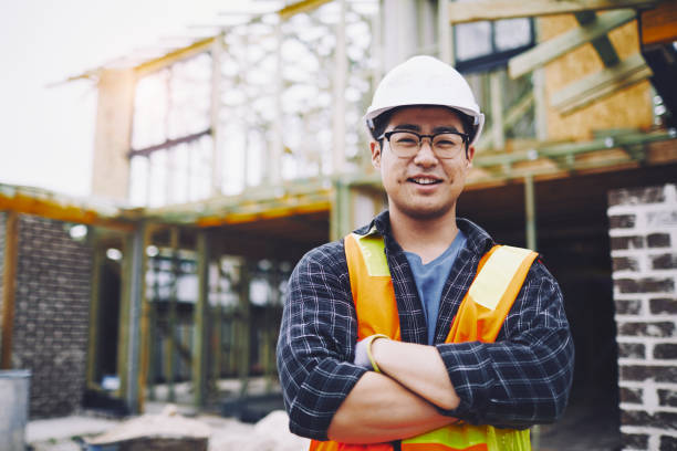 pekerja konstruksi di australia dalam membangun situs bekerja dan melakukan tugas. - kontraktor bangunan foto potret stok, foto, & gambar bebas royalti