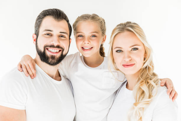 istock happy parents with daughter 910113898