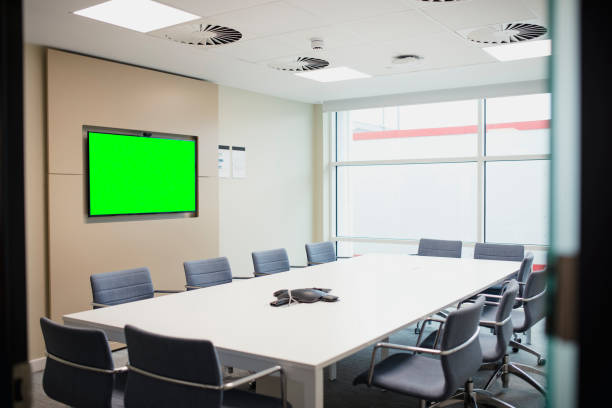 istock Empty Meeting Room with Chroma Key Screen on the Wall 910119654