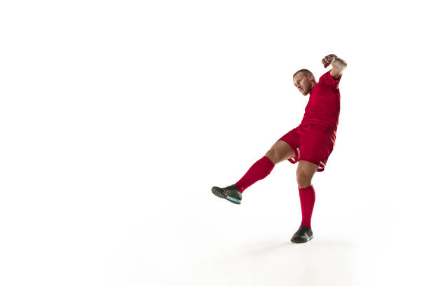 istock Professional football soccer player isolated on white background 910128534