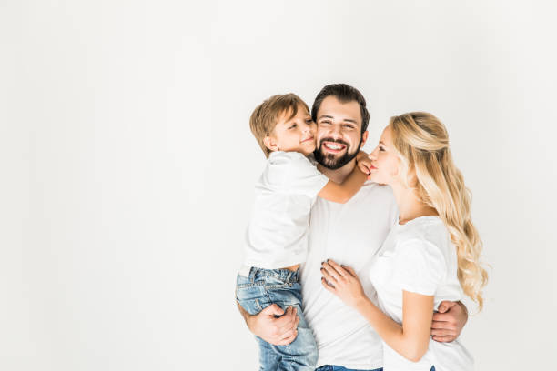 istock happy parents with little son 910132486