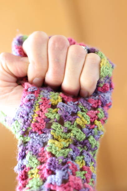 istock Hand in Colorful winter gloves 910135464
