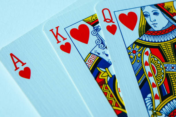 istock Playing cards macro, poker game winning concept. 910143176
