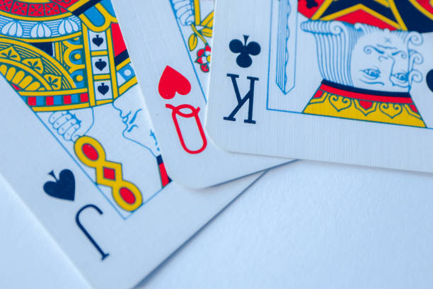 istock Playing cards macro, poker game winning concept. 910143640