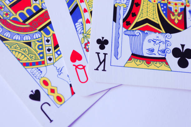istock Playing cards macro, poker game winning concept. 910143696