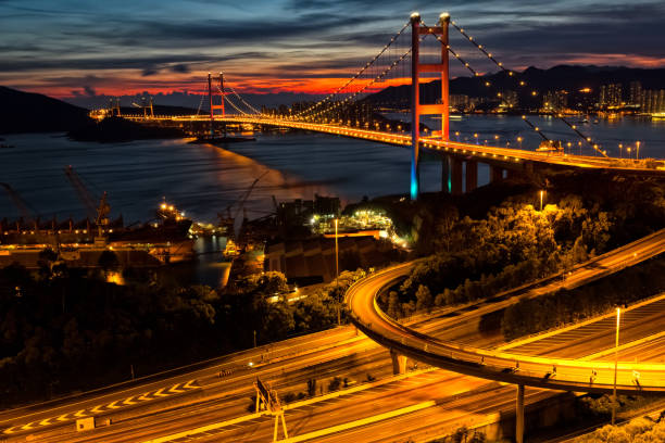 istock Sunset with beautiful bridge in Hong Kong 910143842