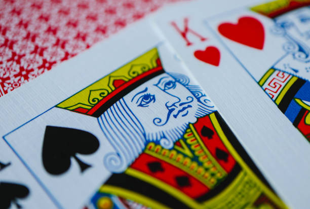 istock Playing cards macro, poker game winning concept. 910143948