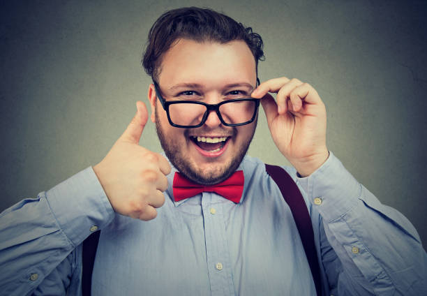 istock Cheerful man showing thumb up 910145162