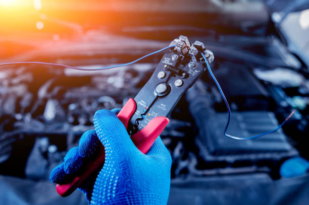 istock Repairing engine at service station. Car repair. 910145384