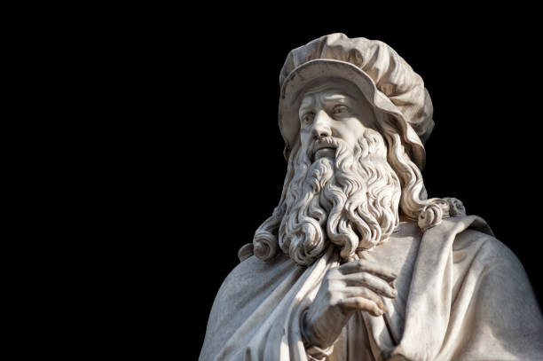 Leonardo Da Vinci statue on black background (path selection included) Florence, Italy - December 22, 2017: Leonardo Da Vinci statue, by Luigi Pampaloni, 1839. It is located in the Uffizi courtyard, in Florence. anatomist photos stock pictures, royalty-free photos & images