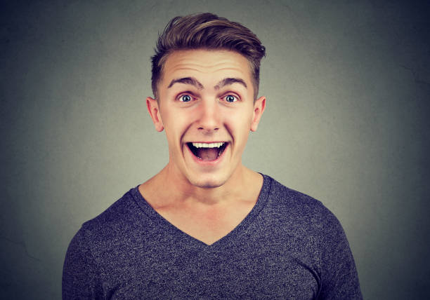 istock Man excited with surprise on face 910148780