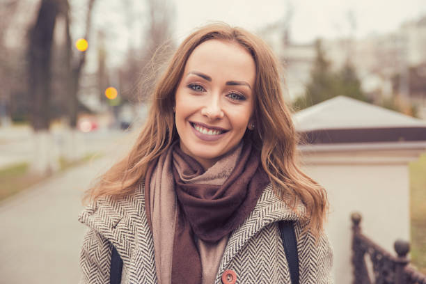 istock Beautiful content woman on urban background 910148808
