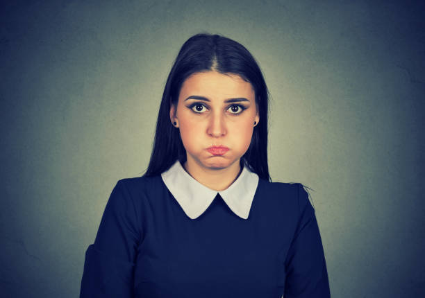 istock Woman looking childish while being upset 910151544