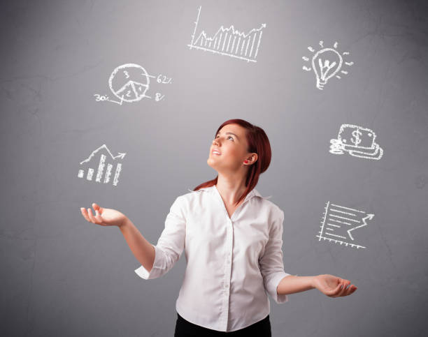 istock beautiful young woman juggling with statistics and graphs 910151852