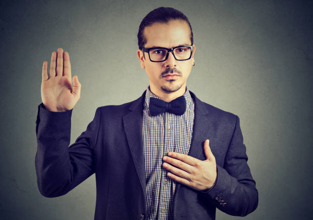 istock Confident man giving sacred promise 910154748
