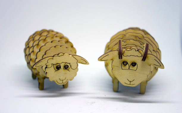 istock Wooden figures of sheeps 910155546