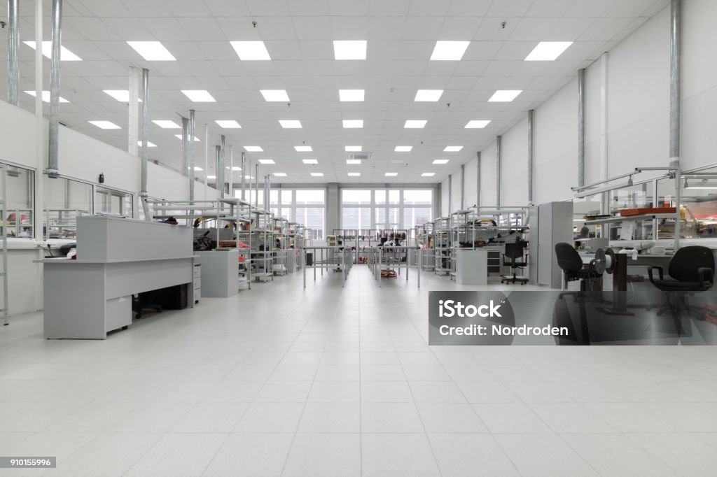 Factory for the manufacture of electronic printed circuit boards. Workshop surface mounting and pre-assembly Clean production room. Manufacture of industrial electronics. Shop assembly of electronic components. Laboratory Stock Photo