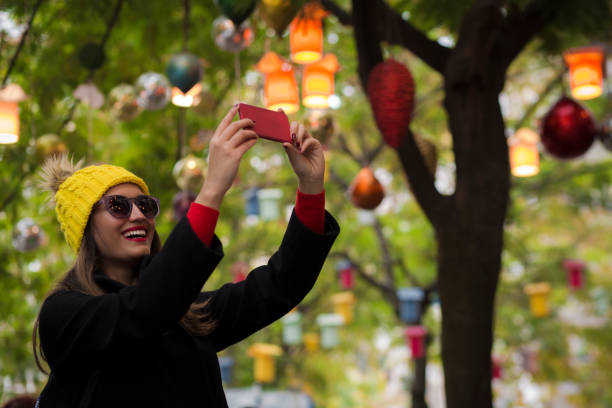 istock Smiling woman taking a selfie 910155998