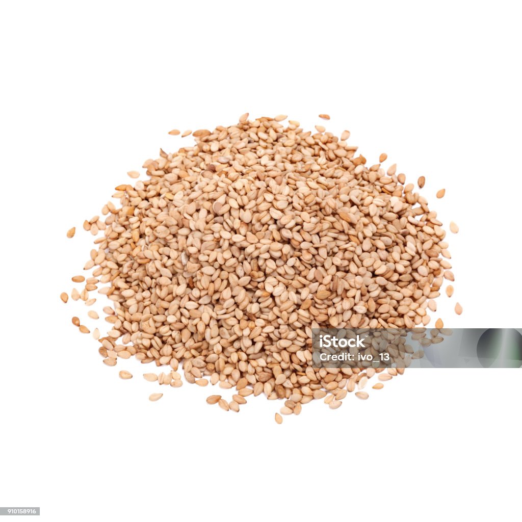 Pile of sesame. Sesame seeds isolated on white Pile of sesame. Sesame seeds isolated on white background Sesame Seed Stock Photo