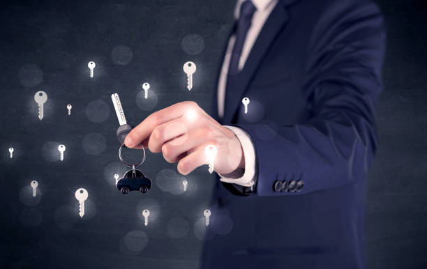 istock Businessman holding keys with keys around 910166786