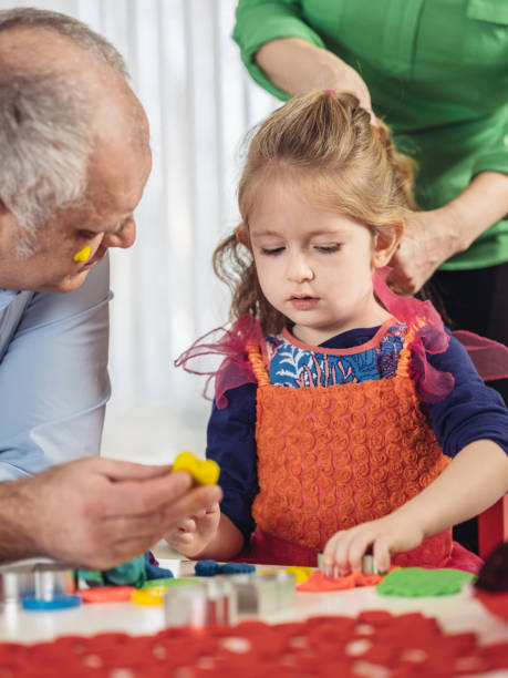 istock Father and Daughter crafting 910170730