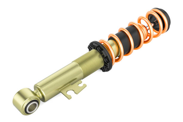 istock golden car shock absorber, 3D rendering isolated on white background 910171596