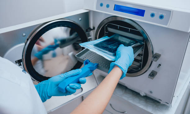 istock Sterilizing medical instruments in autoclave 910178144