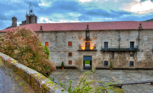 Outdoors view of San Clodio monastery in Galicia, Spain, at dusk.