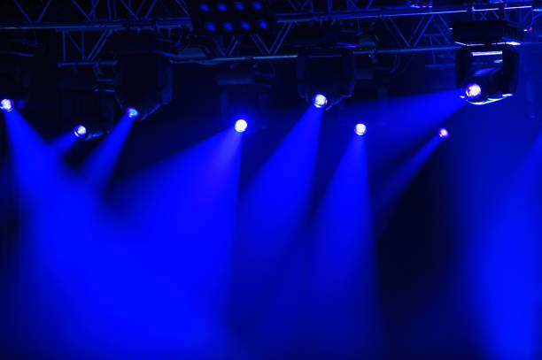 Blue stage spotlights stock photo
