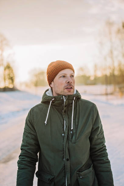 istock Man outdoors on cold frosty winters day 910189296