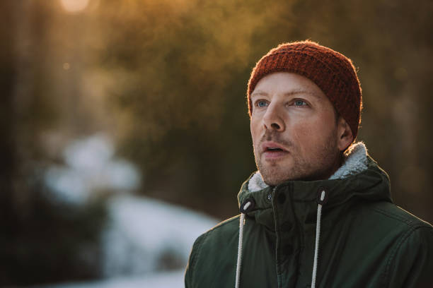 istock Man outdoors on cold frosty winters day 910192260
