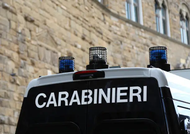 Van vehicle of italian police force in Italy with text CARABINIERI