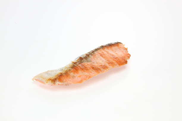 Pictured grilled salmon in a white background.