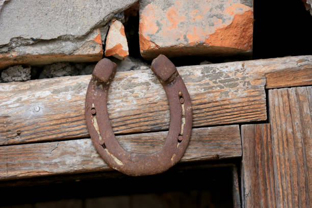 istock old horseshoe over door 910203790