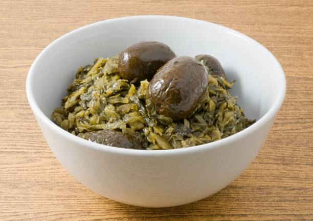 istock Chopped Pickled Green Cabbage in A Bowl 910204210