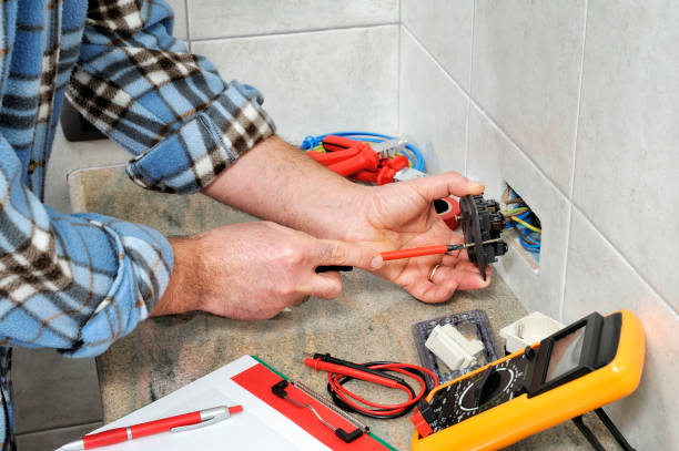 istock Electrician technician at work on a residential electric system. 910204406