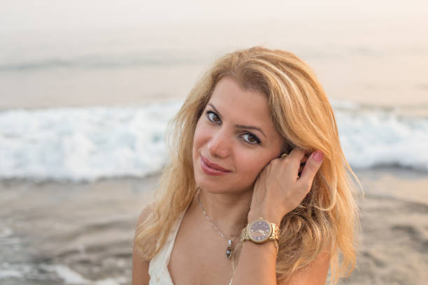istock Beautiful blonde female with tender smile 910207222