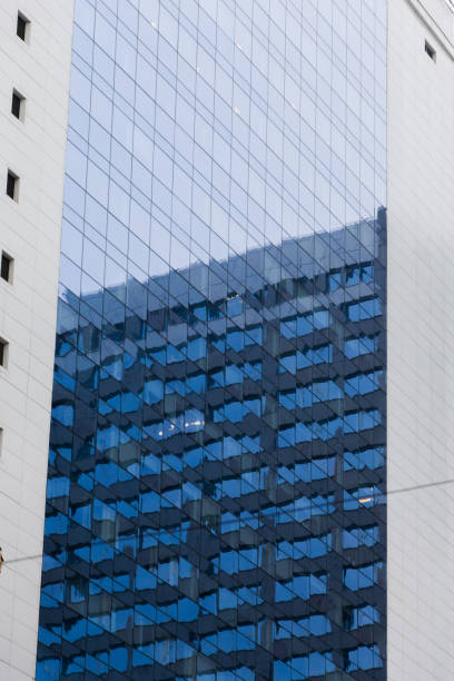 istock Windows and reflections in a crooked house 910207258