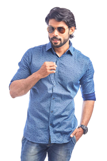 istock young man giving pose with sunglasses 910210552