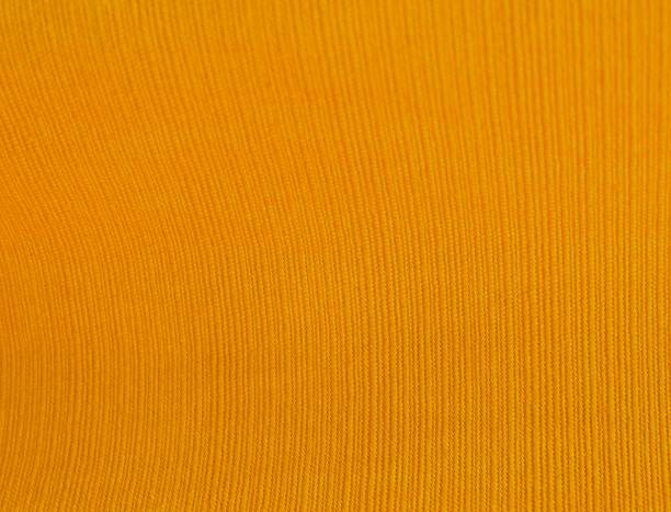 istock Close Up Background of Yellow Textile Texture 910211502